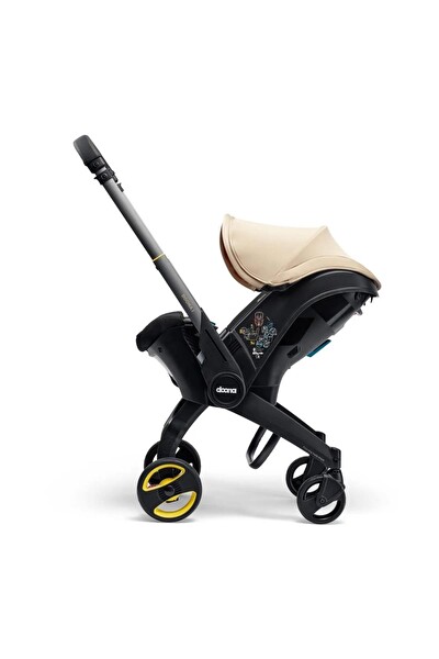 Doona Bebek Arabasına Dönüşen Tekerlekli I-Size Ana Kucağı Oto Koltuğu - Sahara Sand