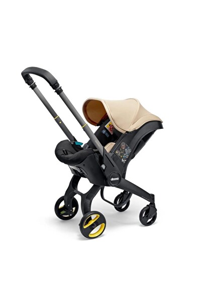 Doona Bebek Arabasına Dönüşen Tekerlekli I-Size Ana Kucağı Oto Koltuğu - Sahara Sand
